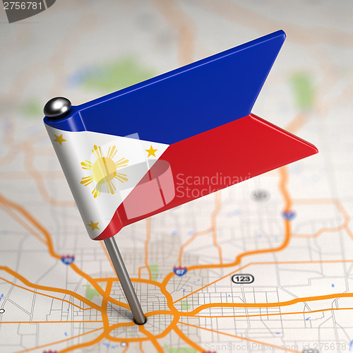 Image of Philippines Small Flag on a Map Background.