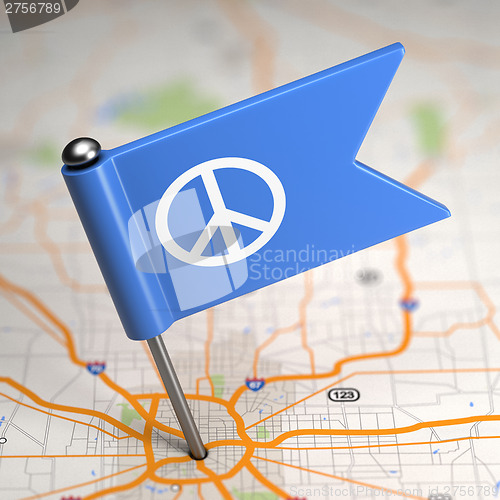 Image of Peace Sign - Small Flag on a Map Background.