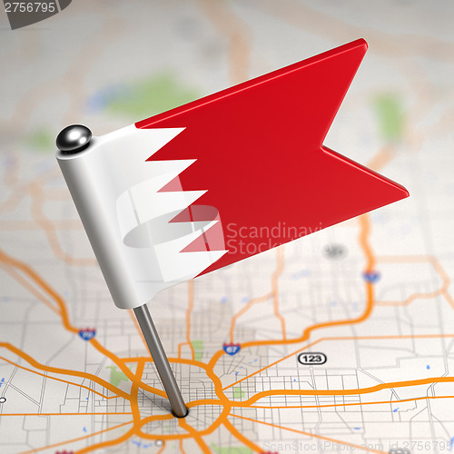 Image of Bahrain Small Flag on a Map Background.