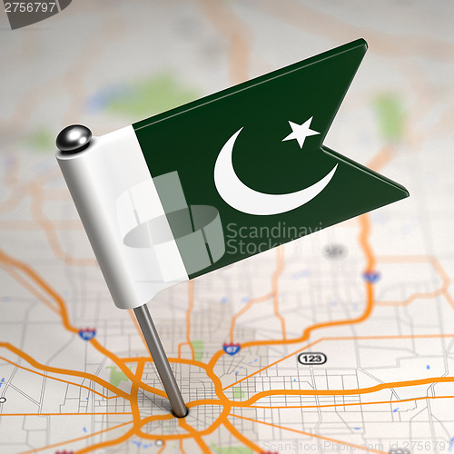 Image of Pakistan - Small Flag on a Map Background.