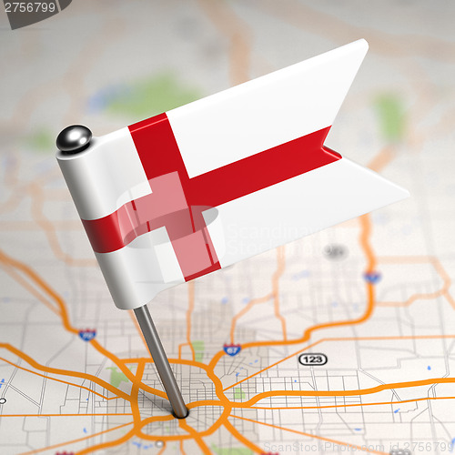Image of England Small Flag on a Map Background.