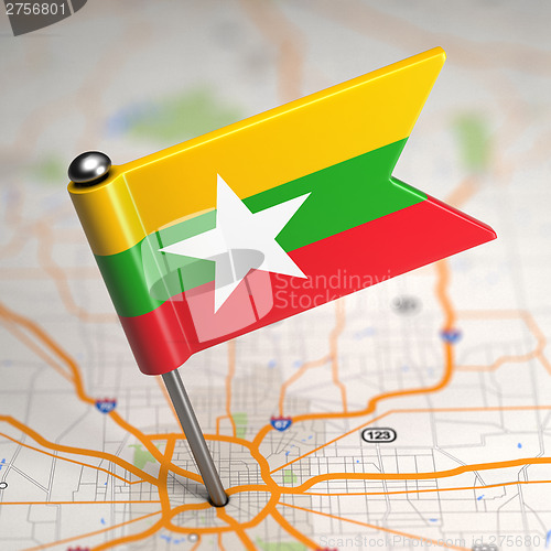 Image of Myanmar Small Flag on a Map Background.