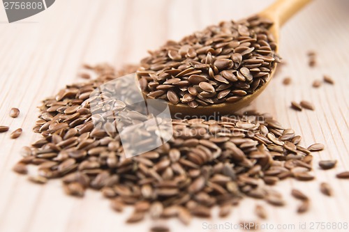 Image of Wooden spoon with flax seed