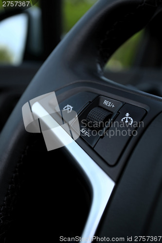 Image of speed limitation on a steering wheel in modern car