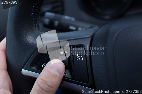 Image of speed limitation on a steering wheel in modern car