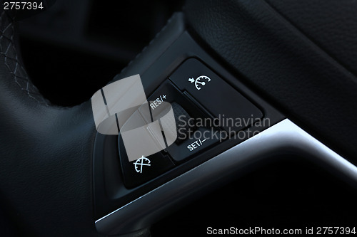 Image of speed limitation on a steering wheel in modern car