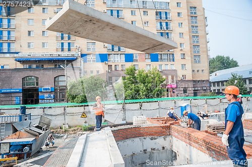 Image of Workers on residental house construction