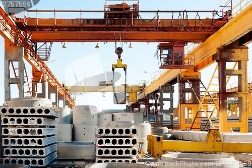 Image of Crane operator works at finished goods warehouse