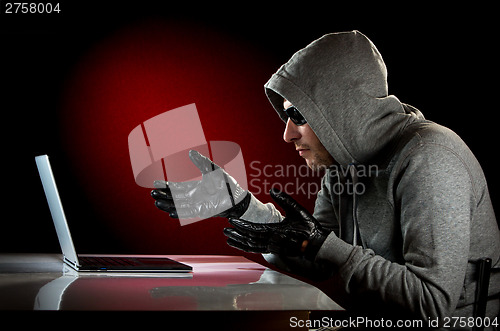 Image of Hacker with laptop