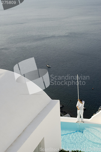 Image of pool cleaning at villa over sea