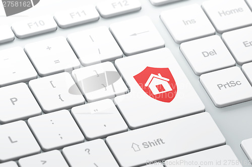 Image of Security concept: Shield on computer keyboard background