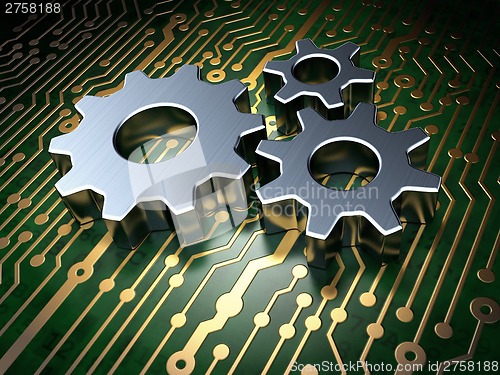 Image of Business concept: Gears on circuit board background