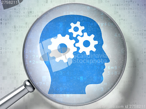 Image of Education concept:  Head With Gears with optical glass on digita