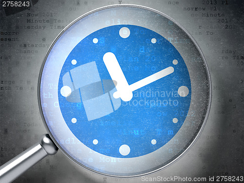 Image of Time concept:  Clock with optical glass on digital background