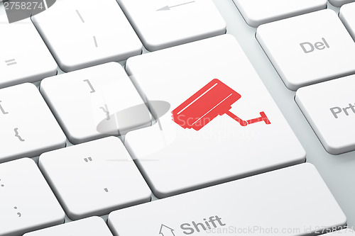 Image of Privacy concept: Cctv Camera on computer keyboard background