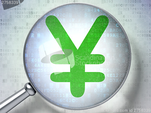 Image of Currency concept:  Yen with optical glass on digital background