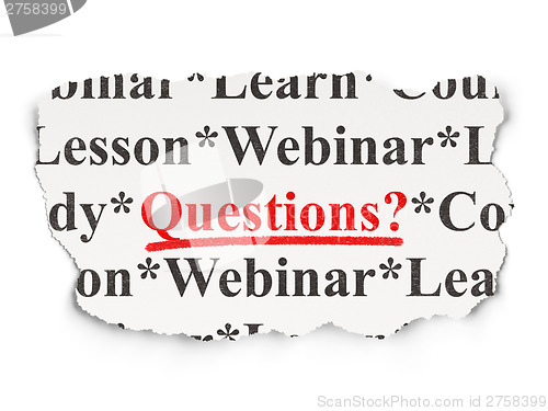 Image of Education concept: Questions? on Paper background