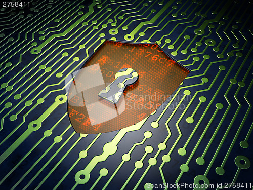 Image of Safety concept: Shield With Keyhole on circuit board background