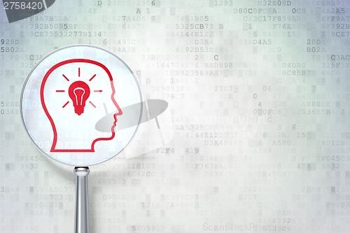 Image of Business concept:  Head With Lightbulb with optical glass on dig