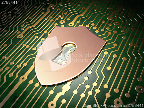 Image of Privacy concept: Shield With Keyhole on circuit board background