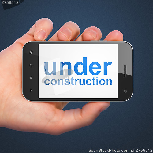 Image of SEO web design concept: Under Construction on smartphone