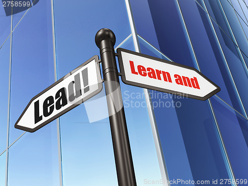 Image of Education concept: Learn and Lead! on Building background
