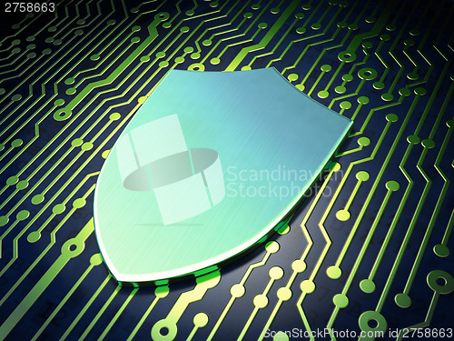 Image of Security concept: Shield on circuit board background