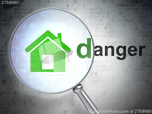 Image of Protection concept: Home and Danger with optical glass