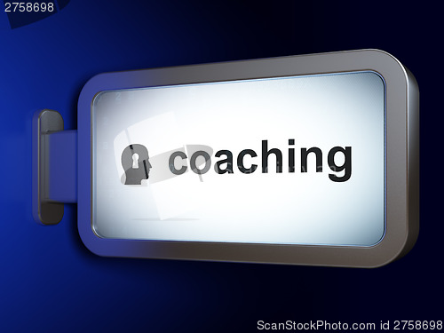 Image of Education concept: Coaching and Head With Keyhole on billboard b