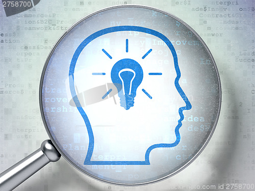 Image of Business concept:  Head With Lightbulb with optical glass on dig