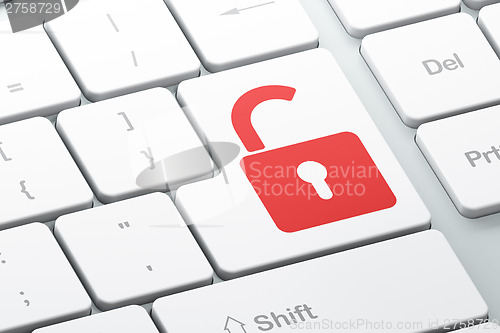 Image of Information concept: Opened Padlock on computer keyboard backgro