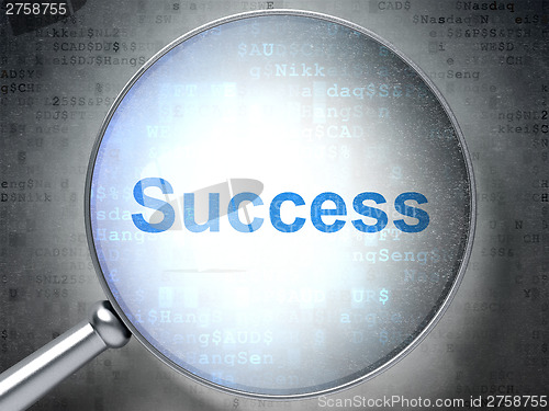 Image of Finance concept: Success with optical glass