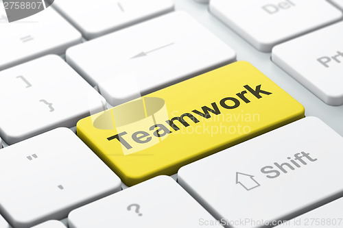 Image of Business concept: Teamwork on computer keyboard background