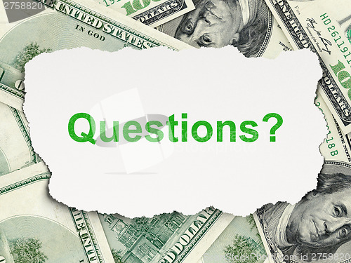 Image of Education concept: Questions? on Money background