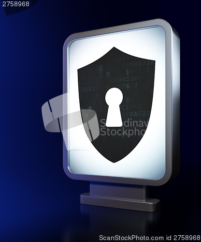 Image of Protection concept: Shield With Keyhole on billboard background