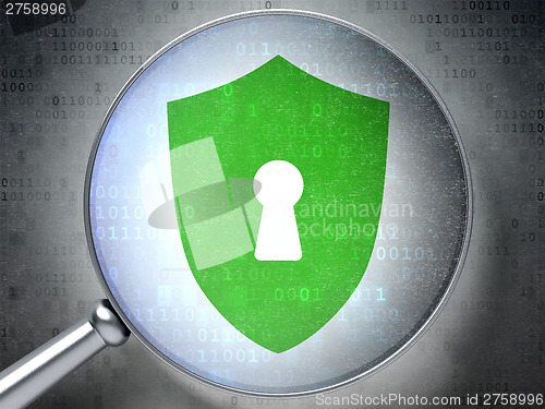 Image of Security concept:  Shield With Keyhole with optical glass on dig