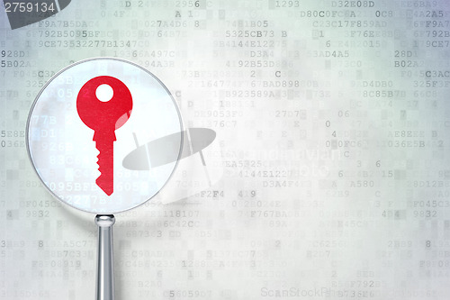 Image of Security concept:  Key with optical glass on digital background
