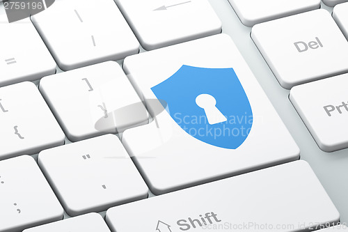 Image of Safety concept: Shield With Keyhole on computer keyboard backgro