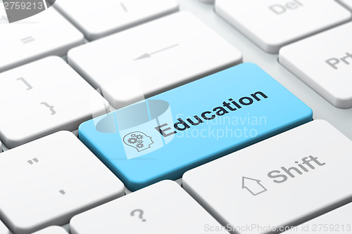 Image of Education concept: Head With Gears and Education on computer key