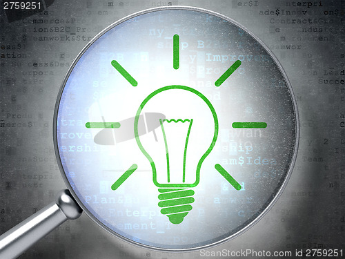 Image of Finance concept:  Light Bulb with optical glass on digital backg