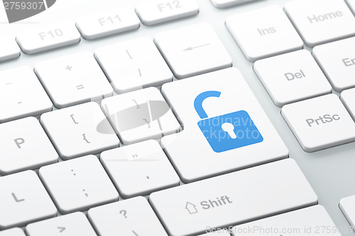 Image of Security concept: Opened Padlock on computer keyboard background