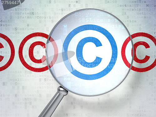 Image of Law concept: Copyright with optical glass on digital background