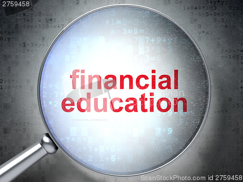 Image of Education concept: Financial Education with optical glass on dig