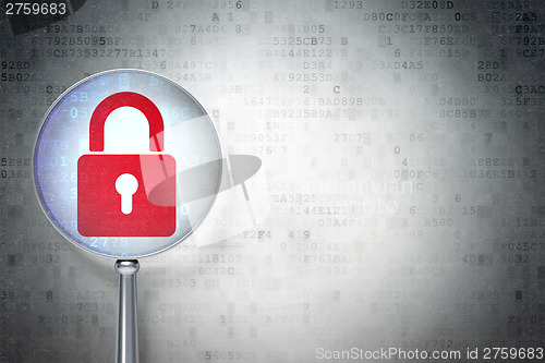 Image of Information concept:  Closed Padlock with optical glass on digit