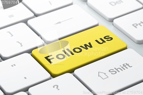 Image of Social media concept: Follow us on computer keyboard background