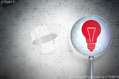 Image of Finance concept:  Light Bulb with optical glass on digital backg