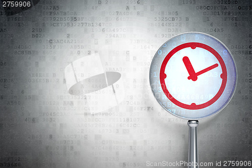Image of Time concept:  Clock with optical glass on digital background