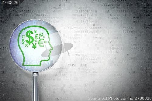 Image of Business concept:  Finance Symbol with optical glass on digital