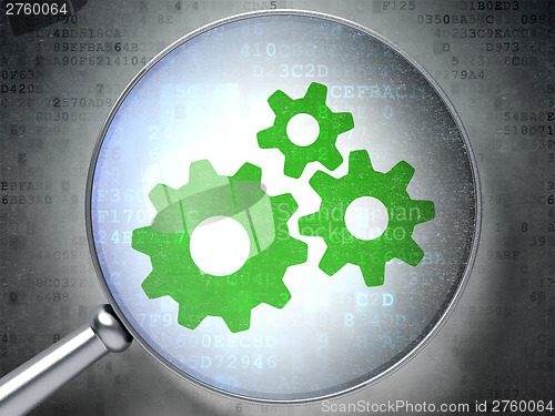 Image of Web design concept:  Gears with optical glass on digital backgro