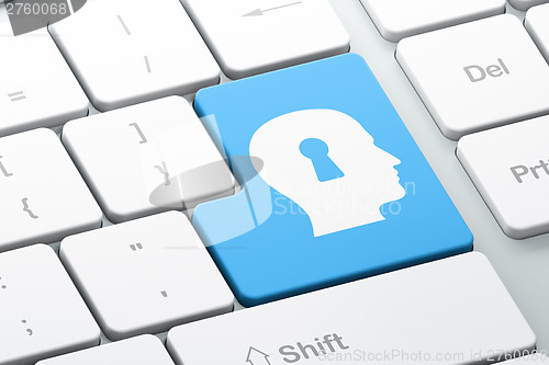 Image of Education concept: Head Whis Keyhole on computer keyboard backgr